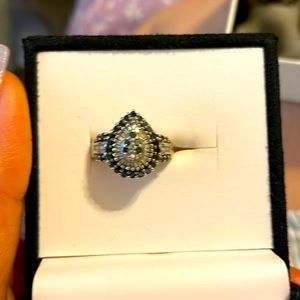 10k white gold with back and white diamonds,